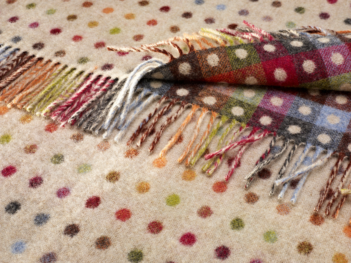 Bronte by Moon Spot merino wool throw beige/multi.