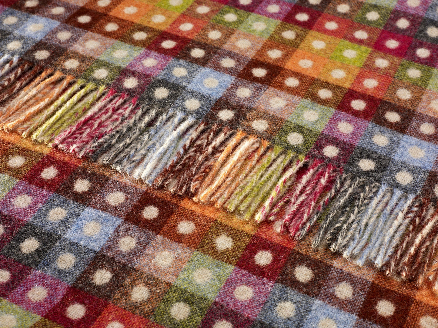 Bronte by Moon Spot merino wool throw beige/multi.