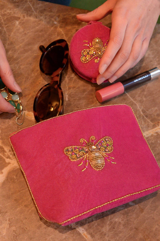 My Doris pink velvet handbeaded bee pouch.