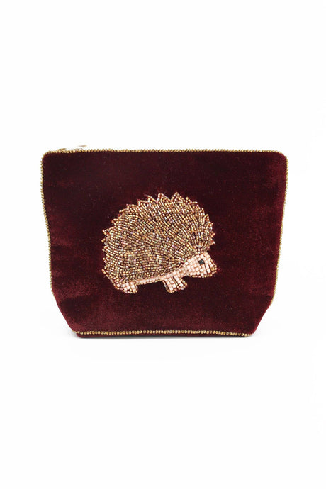 My Doris velvet pouch featuring hand beaded hedgehog on deep brown.