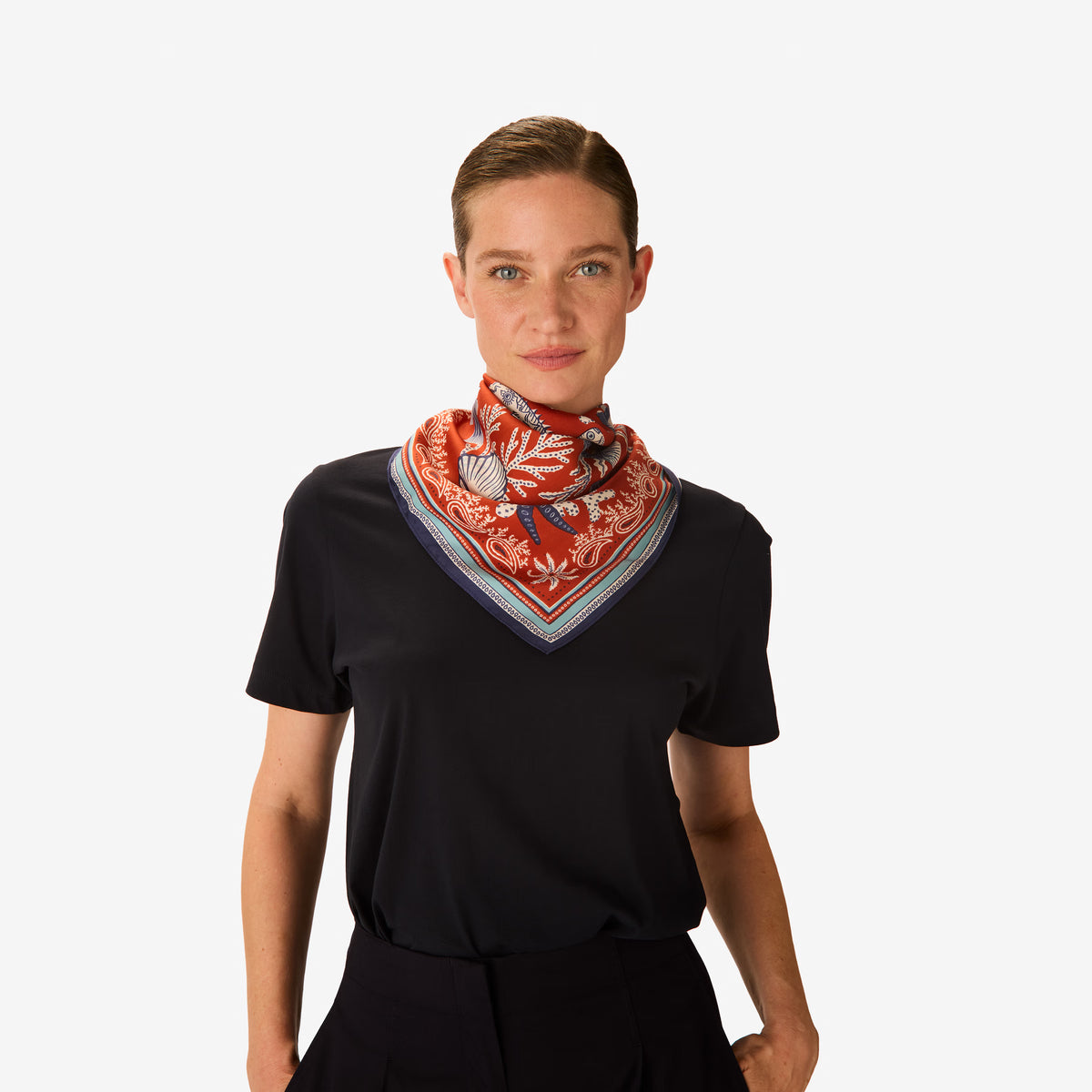 Inoui Editions Neptune pure silk carre, terracotta, blue and white scarf with marine life design on a white background.