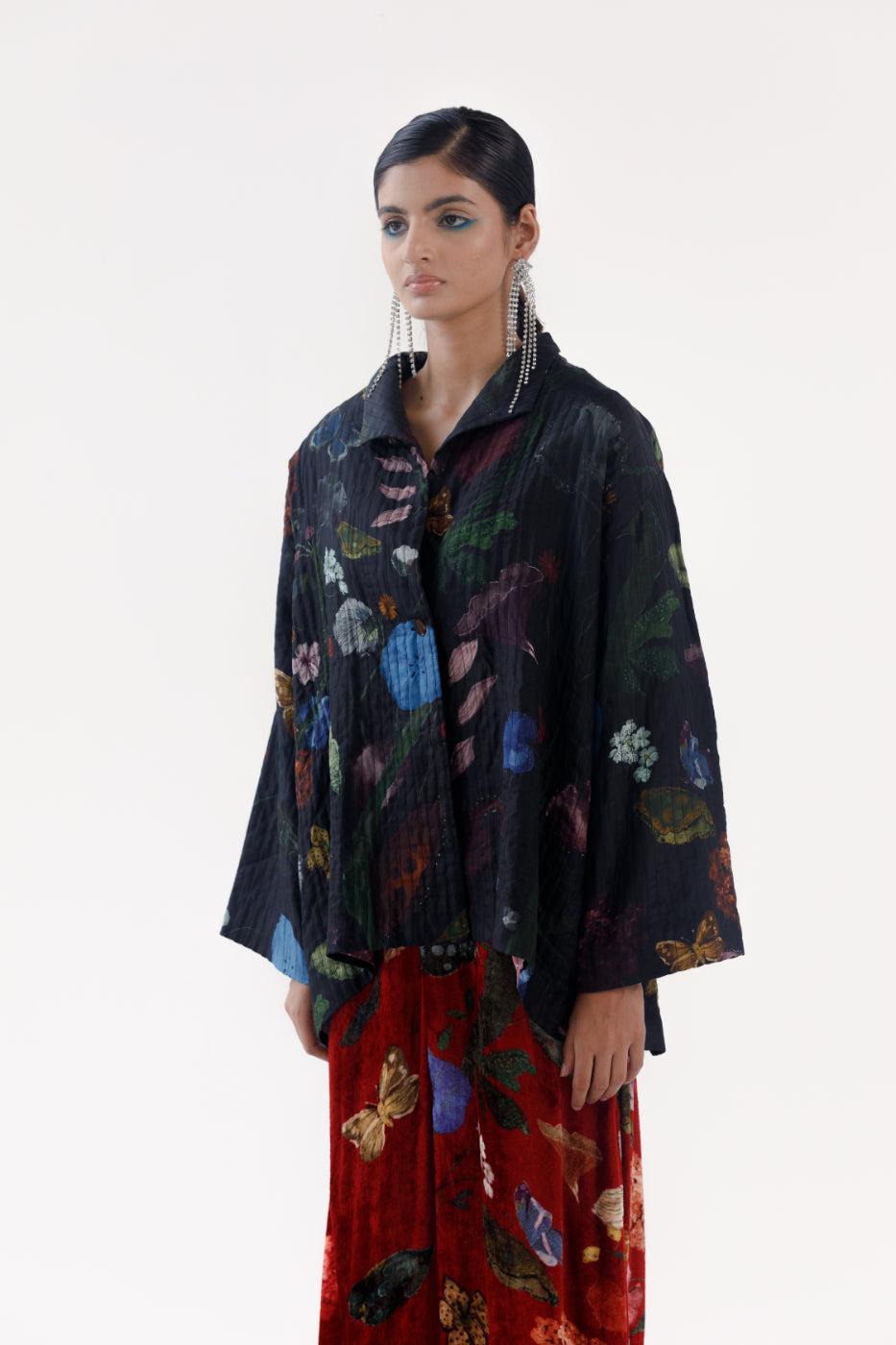 Yavi quilted silk jacket in Vine garden print on ink black, pink block print silk lining.