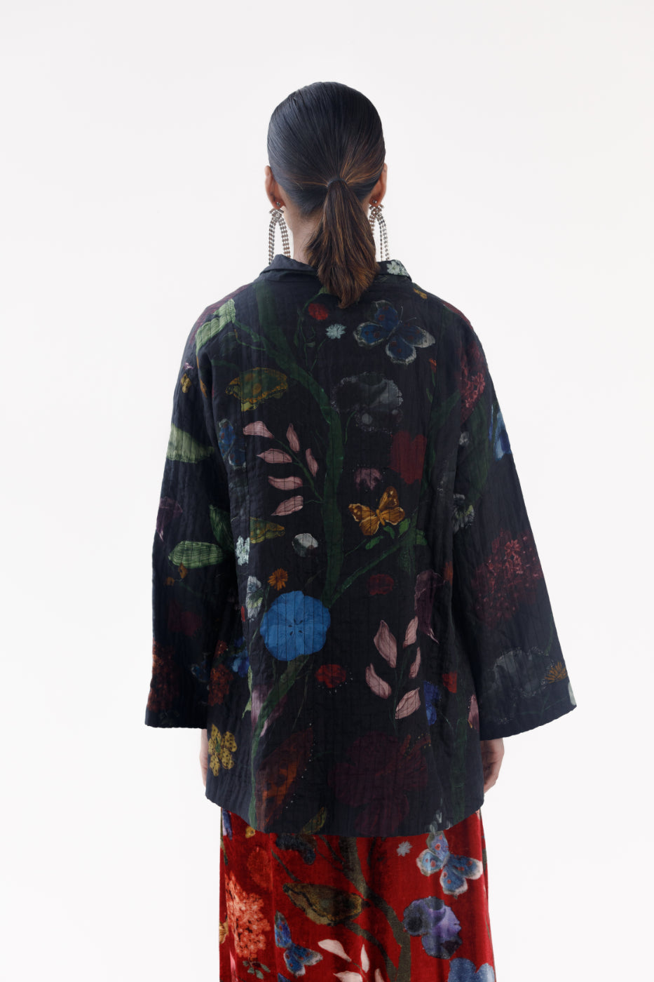 Yavi quilted silk jacket in Vine garden print on ink black, pink block print silk lining.