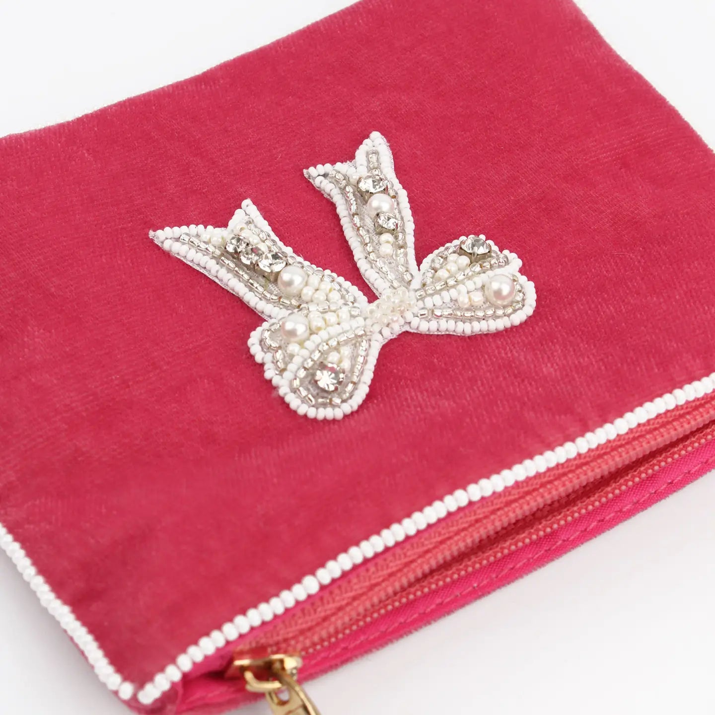 My Doris pink velvet zippered beaded bow pouch.