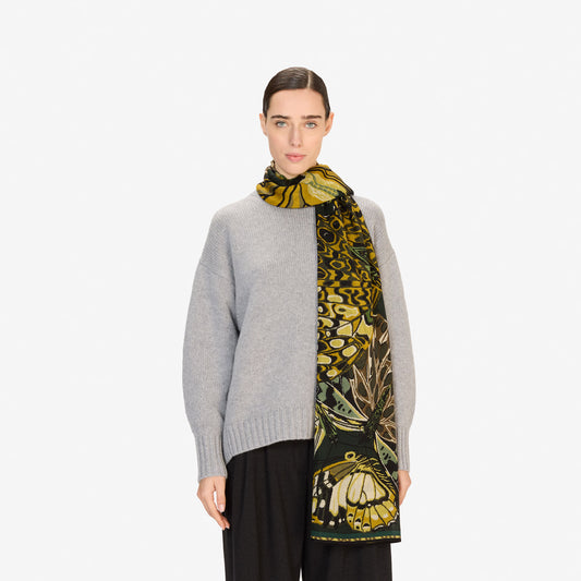 Inoui Editions fine wool scarf Papillons featuring colorful butterfly illustrations in green shades on a white background.