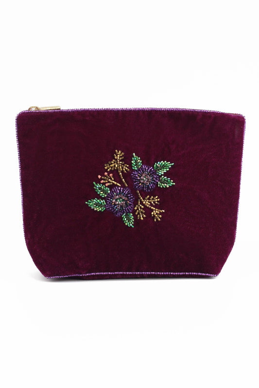 My Doris purple pouch with floral embroidery.