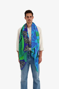 Inoui Editions Mangrovecolourful tropical scene on cotton scarf in blue and emerald.