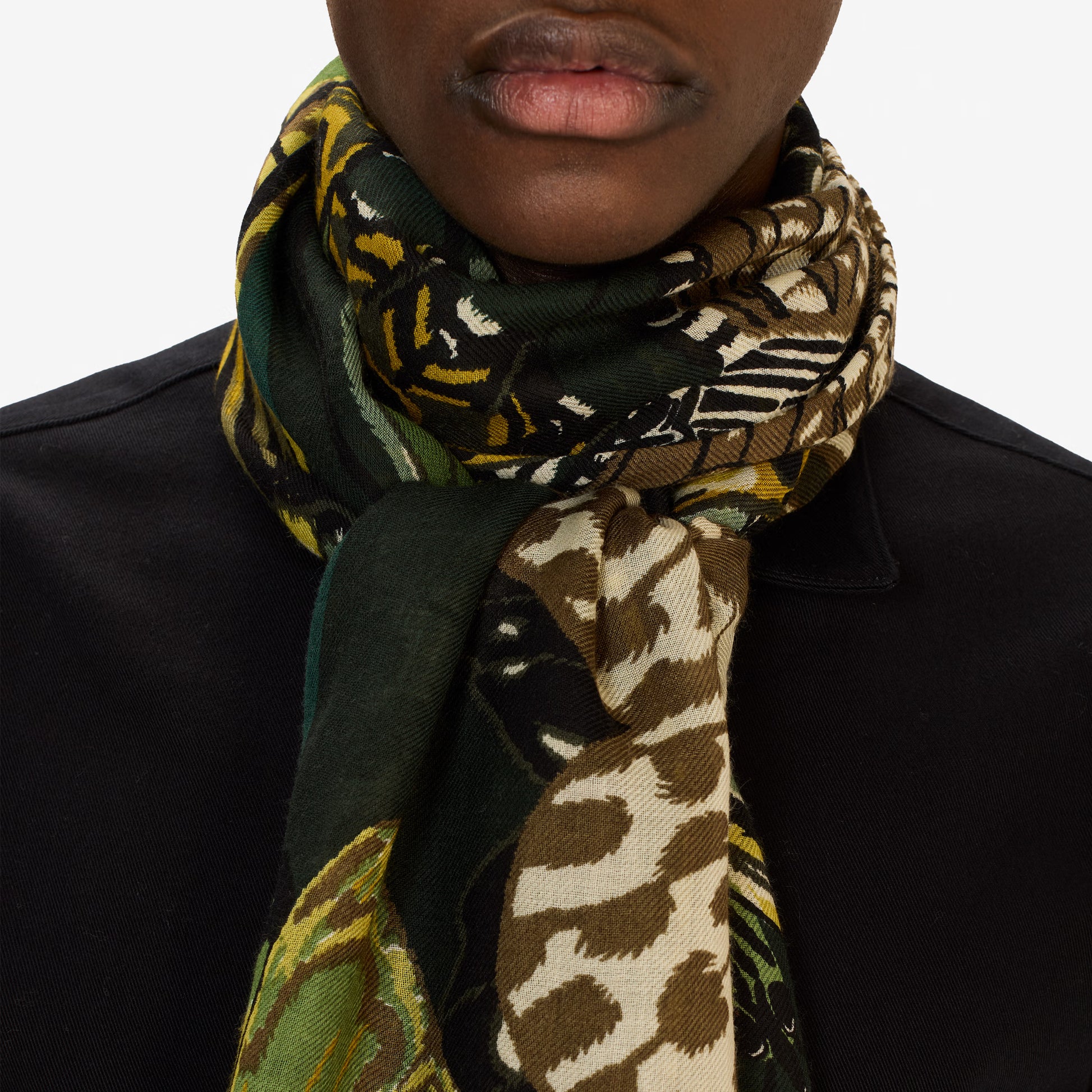 Inoui Editions fine wool scarf Papillons featuring colorful butterfly illustrations in green shades on a white background.