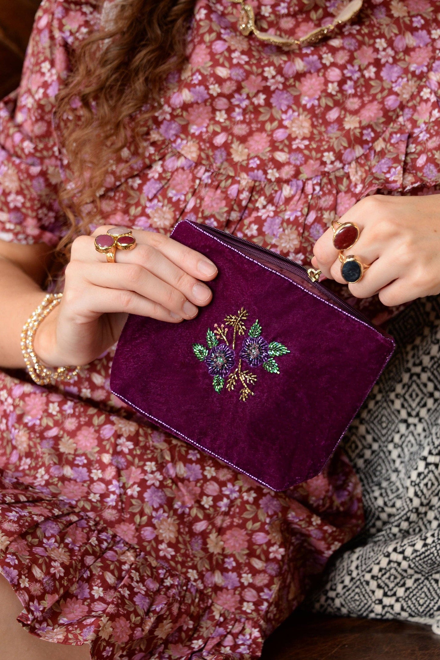 My Doris purple pouch with floral embroidery.