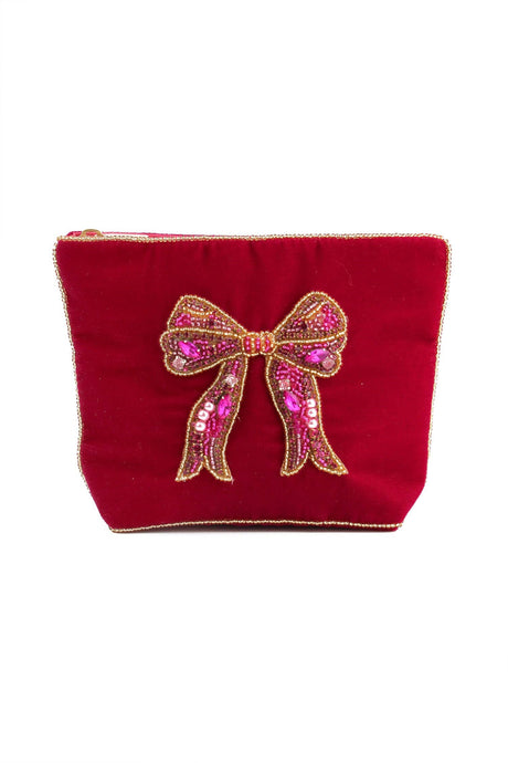 My Doris velvet pouch featuring hand beaded pink bow on crimson.