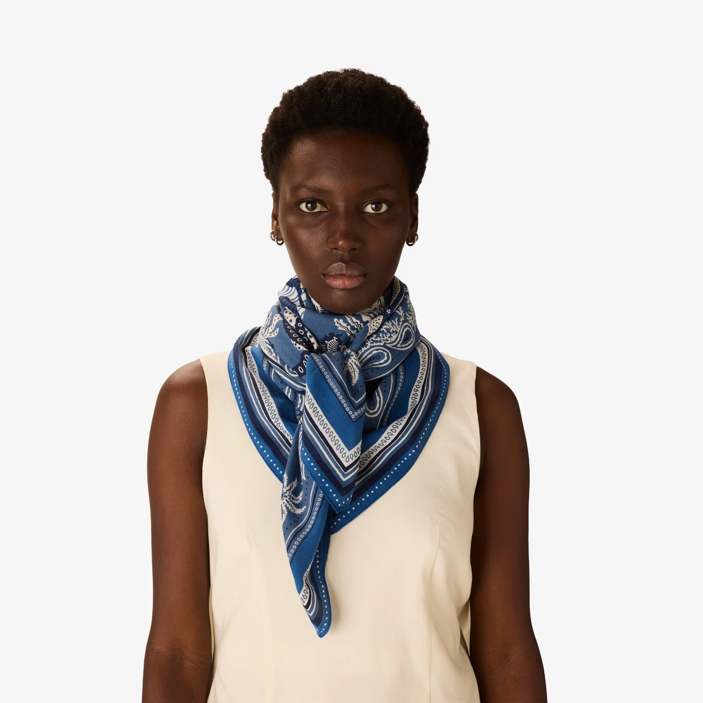 Inoui Editions Neptune pure silk carre, blue and white scarf with marine life design on a white background.