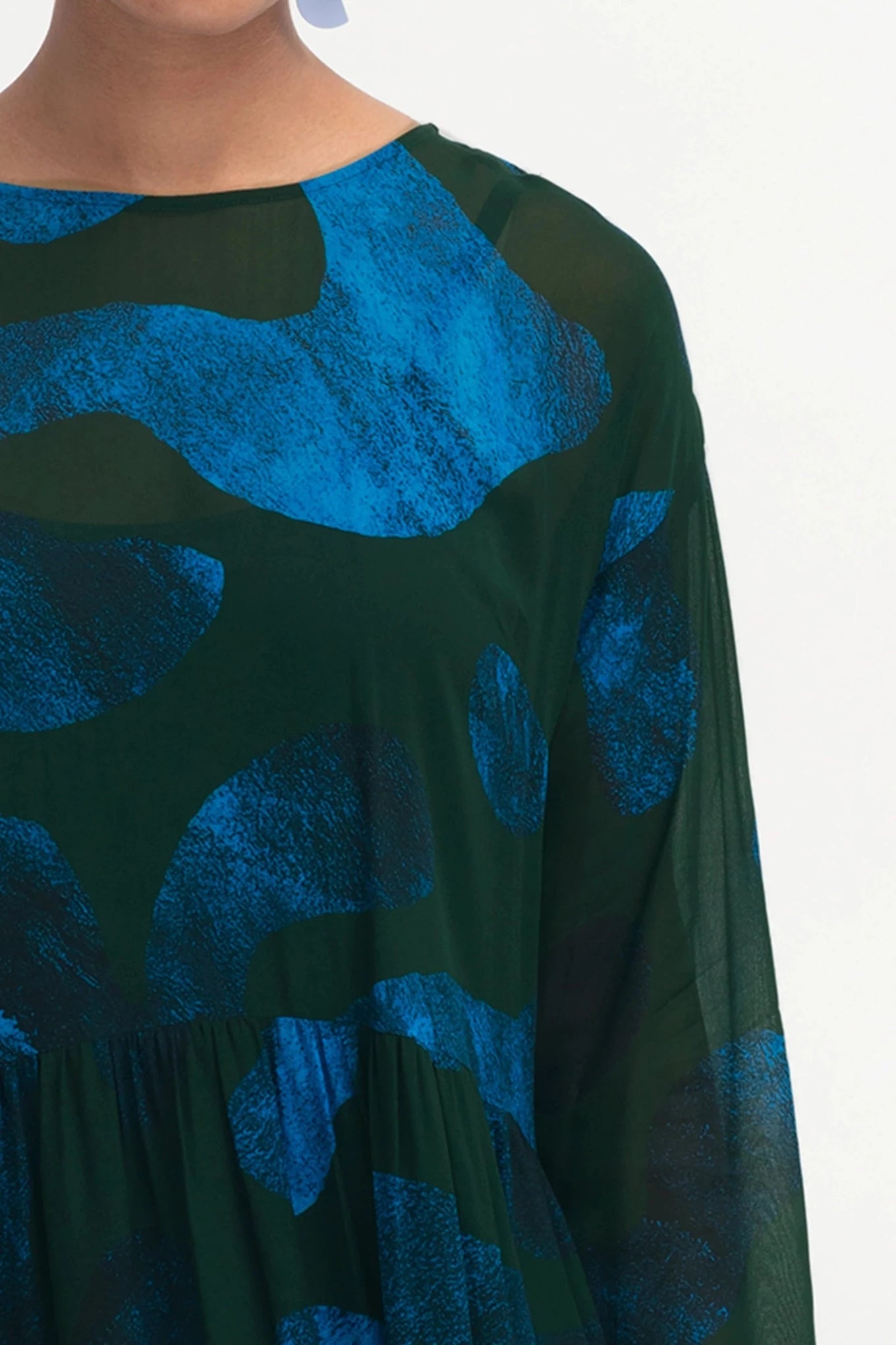 Elk Gira Sheer Dress long-sleeved crew neck dress with a set-in sleeve and dropped shoulder, gathered at waist seam.