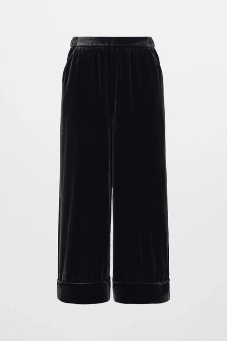 Elk Metti Velvet Pant in charcoal, wide leg with faux cuff, side and back pockets, elastic at the back of the waistband.
