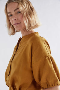 Elk Strom linen top with puff gathered sleeve in honey gold mustard yellow.