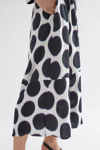 Elk the Label Ero viscose black and white spot print dress, drawstring waist long sleeves.