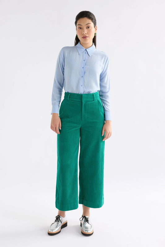Elk Rhes organic cotton corduroy wide leg pants in island green.