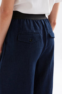 Elk Njolle indigo denim pant with contrast elastic waist.