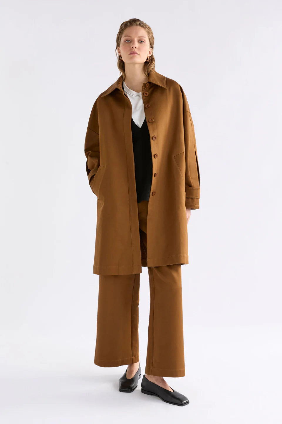 Elk Talli organic cotton coat in cinnamon brown.