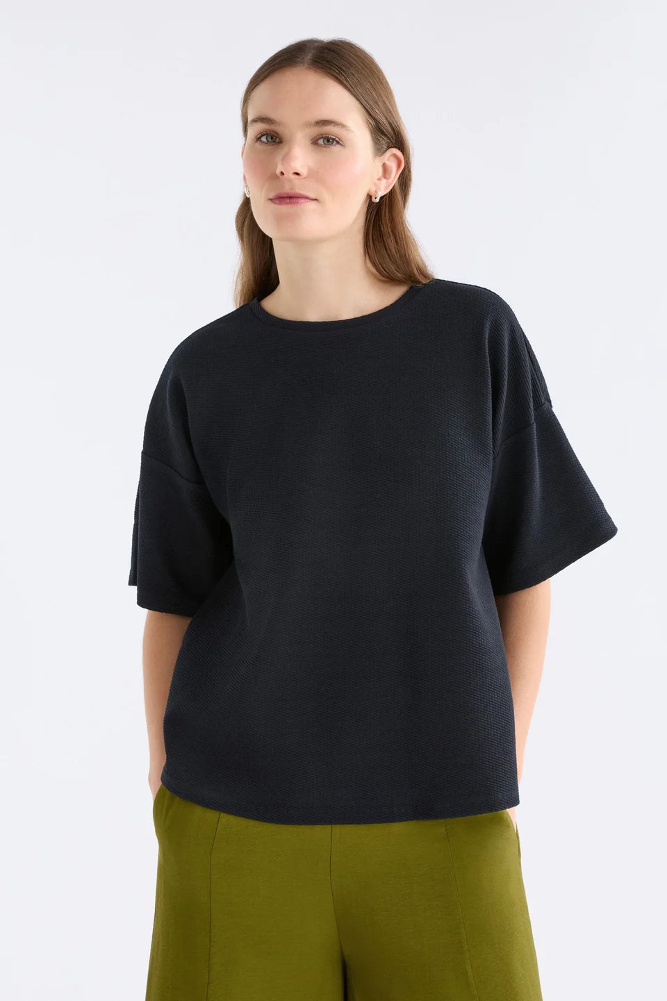 Elk Sanna Tee black short-sleeve crewneck top with a relaxed, oversized fit, in textured organic cotton jersey.