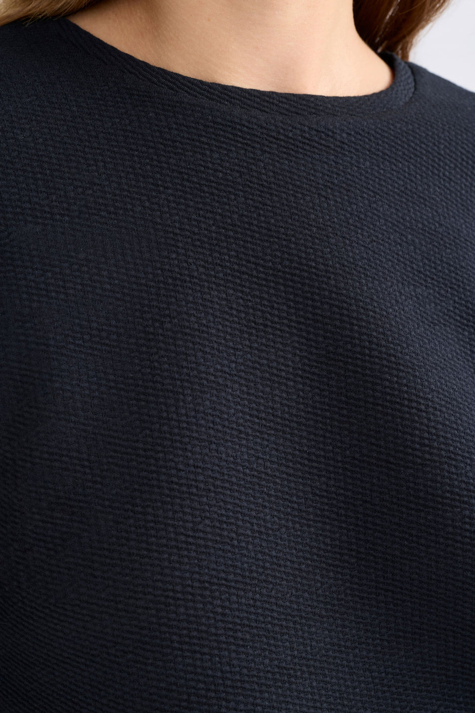 Elk Sanna Tee black short-sleeve crewneck top with a relaxed, oversized fit, in textured organic cotton jersey.
