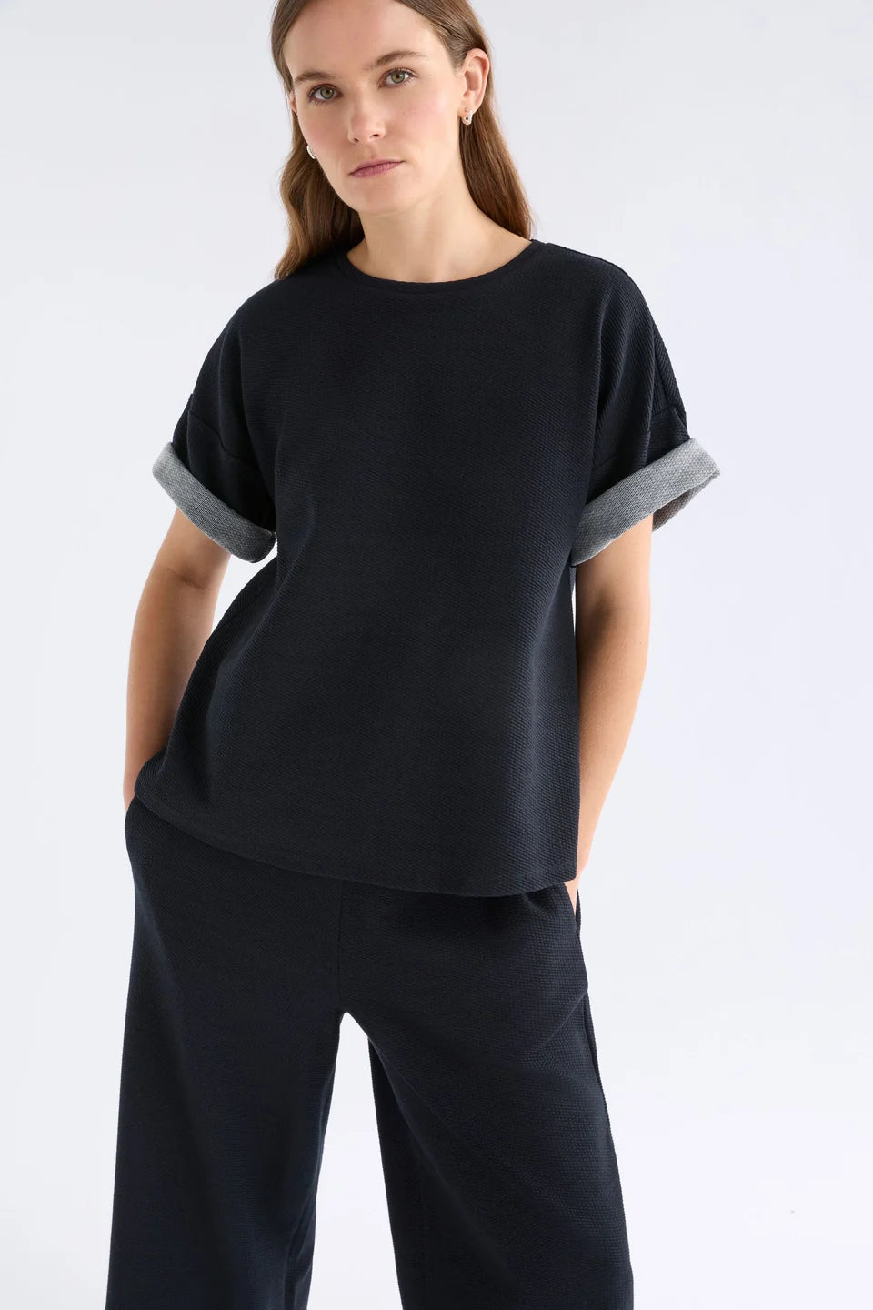 Elk Sanna Tee black short-sleeve crewneck top with a relaxed, oversized fit, in textured organic cotton jersey.