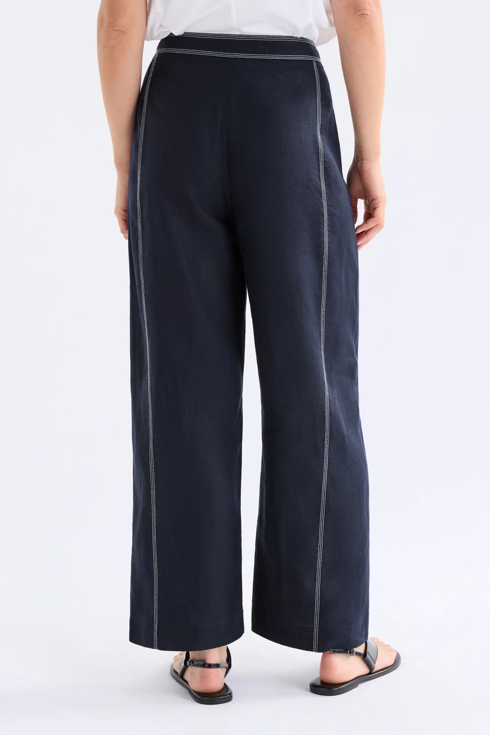 Elk Sonnen French linen pants, midnight navy with white top stitching.
