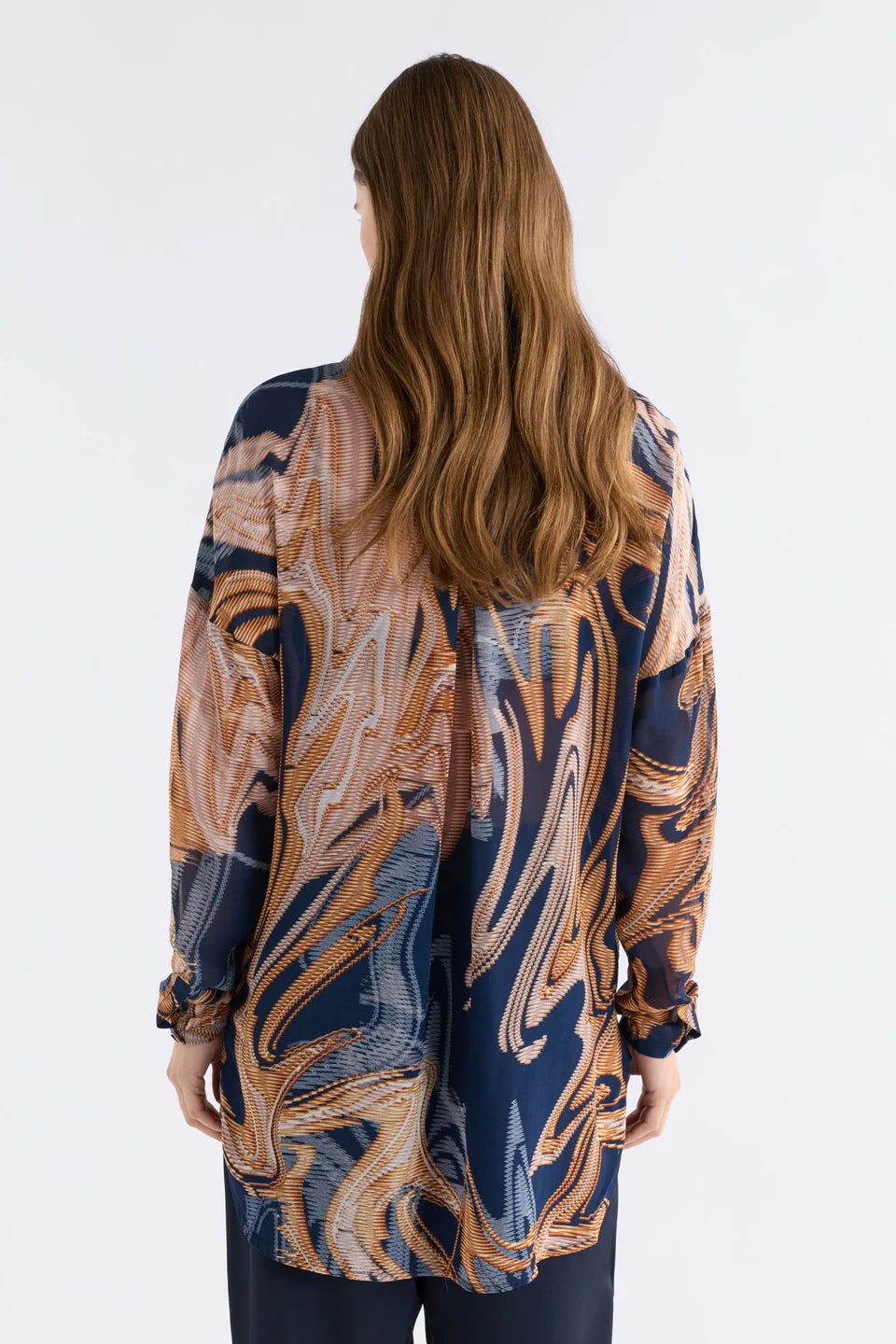 Elk Eir shirt in abstract neutrals print on navy base.
