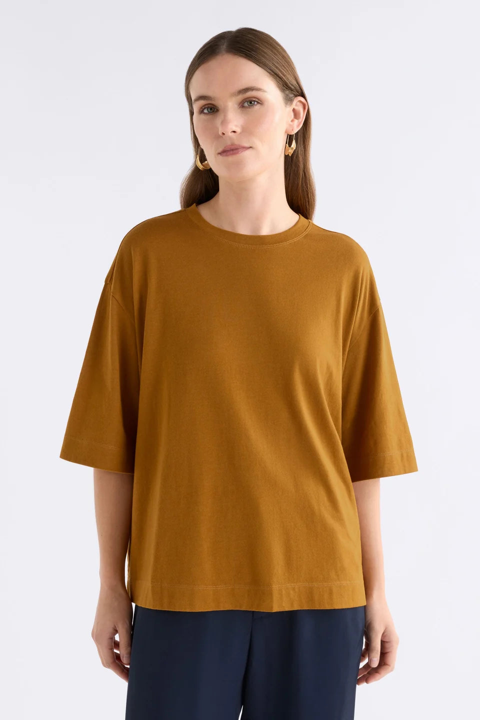 Elk Tiel tshirt in gold, mustard yellow short-sleeve crewneck in organic cotton / modal blend.