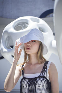 PCNQ made in Japan cotton bucket hat with generous brim in light grey.