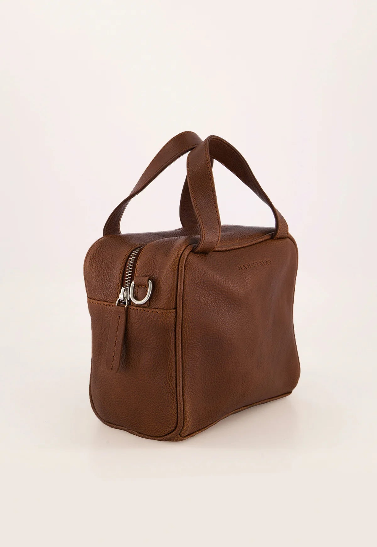 Nancybird Koren leather cross body or handbag in tobacco brown.
