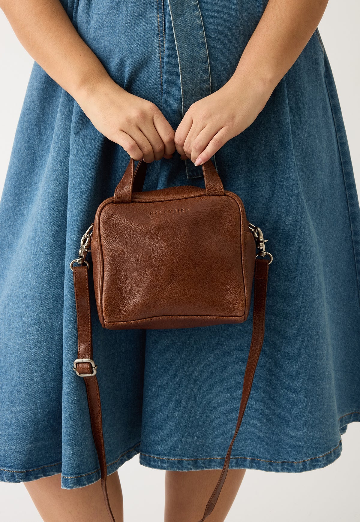 Nancybird Koren leather cross body or handbag in tobacco brown.