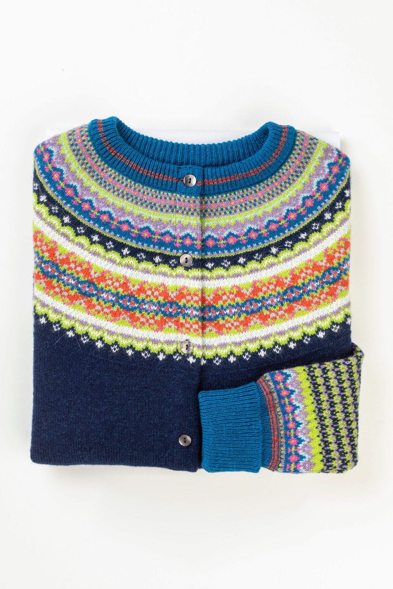 Eribe Scottish fairisle Alpine cardigan in Aurora, navy with fairisle in lime, sapphire blue and orange.