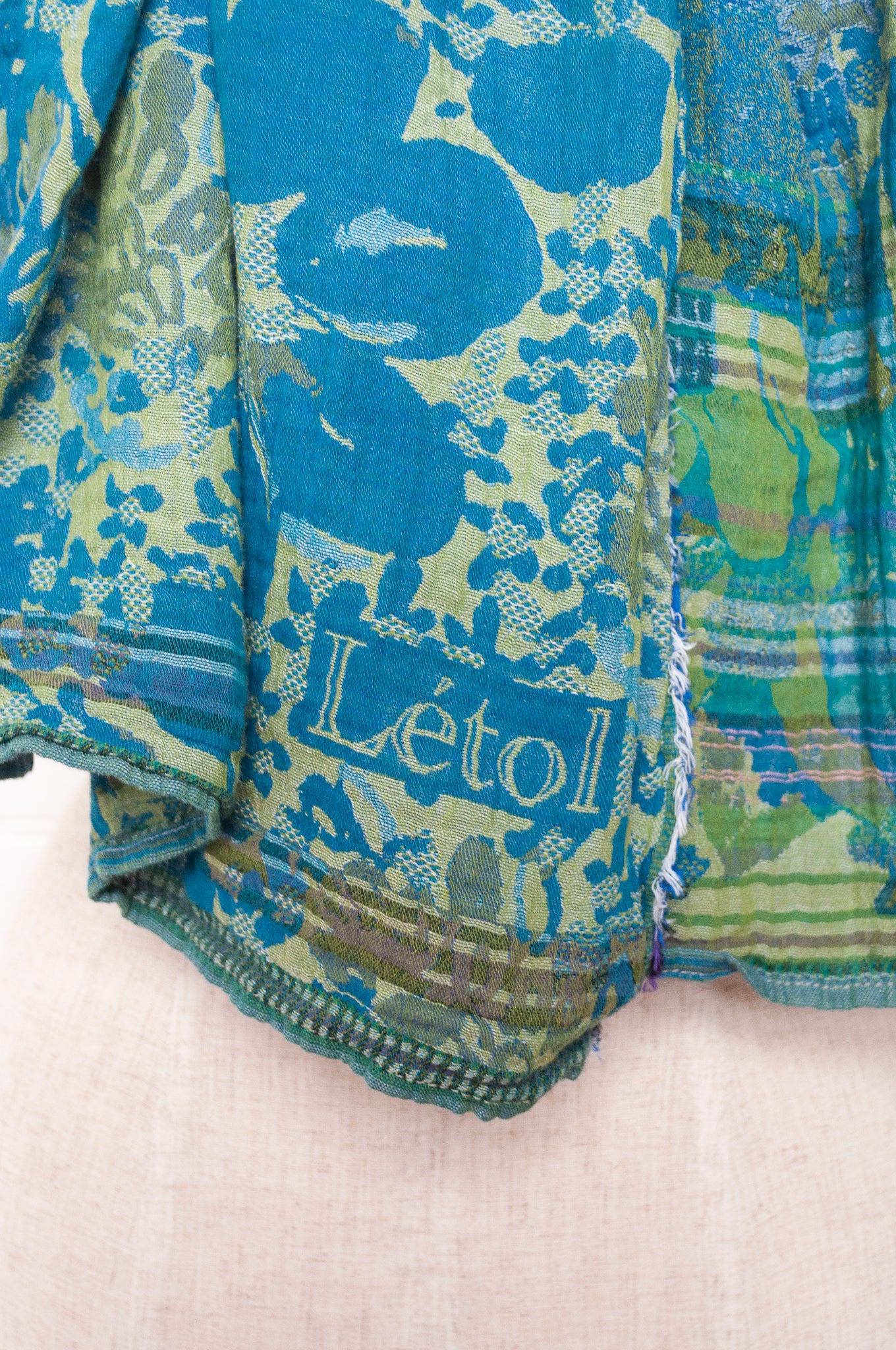 Letol organic cotton floral jacquard scarf Emilienne floral design in lagune, deep turquoise and lime green.
