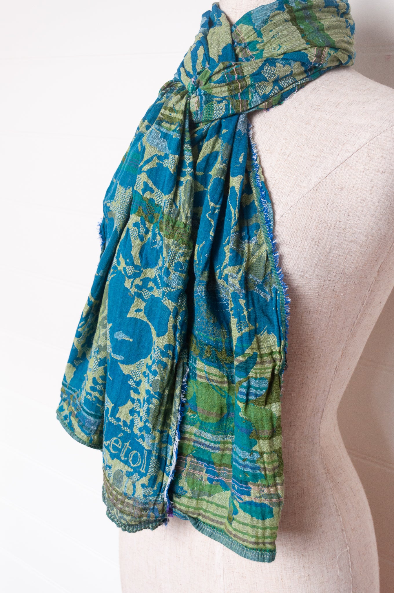 Letol organic cotton floral jacquard scarf Emilienne floral design in lagune, deep turquoise and lime green.