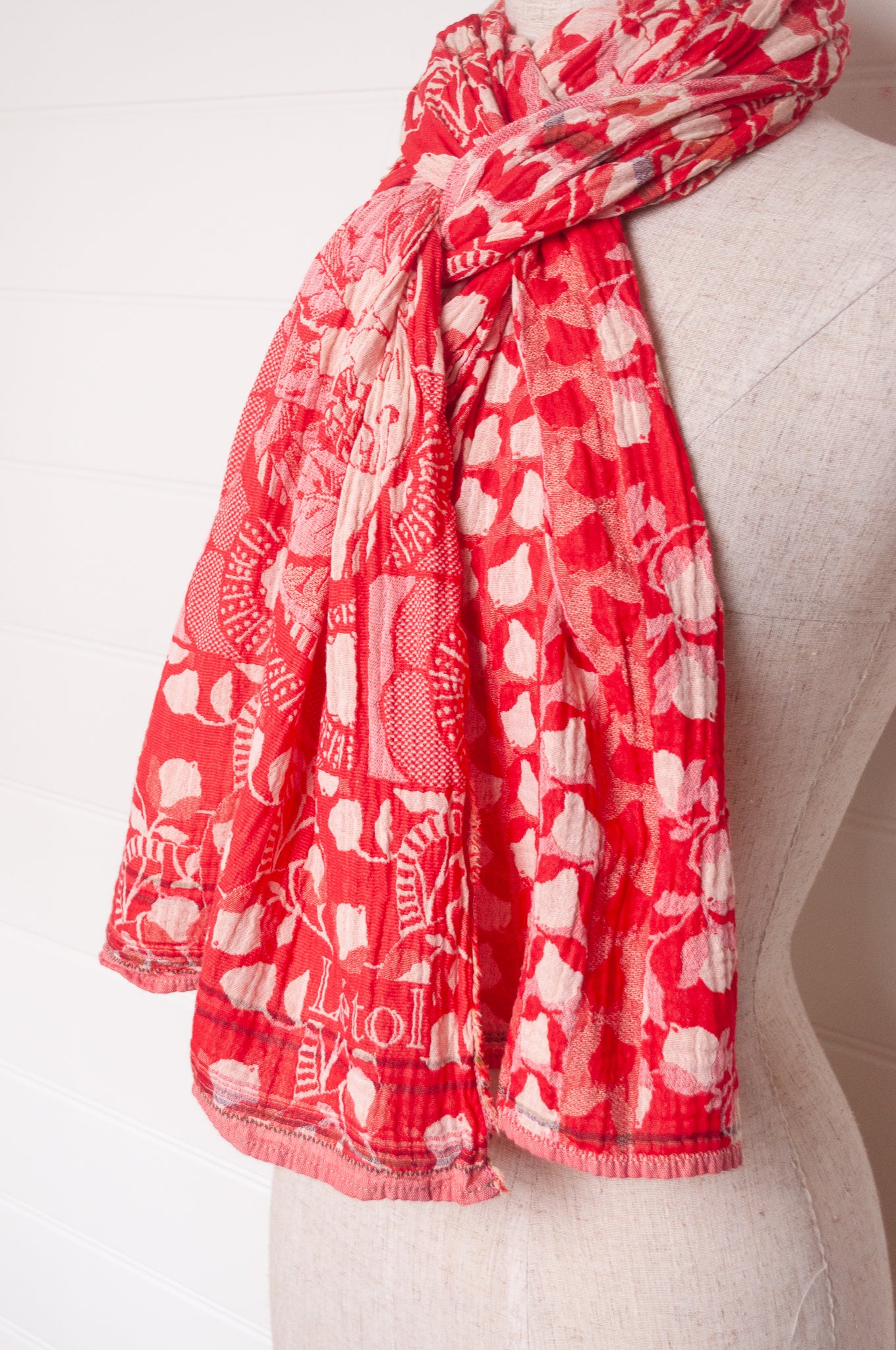 Letol organic cotton jacquard weave scarf Lino flowers and geometrics in cerise cherry red.