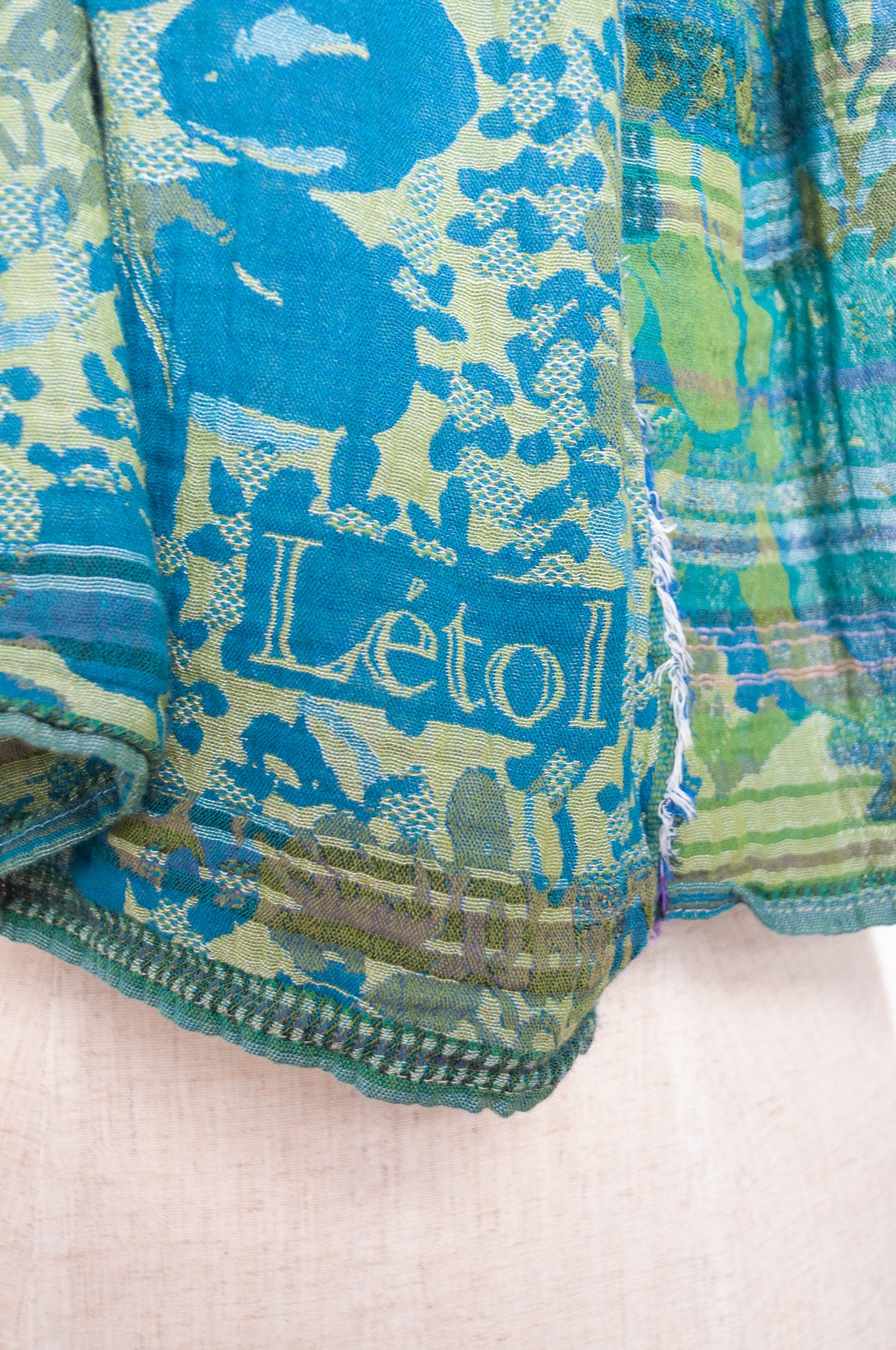 Letol organic cotton floral jacquard scarf Emilienne floral design in lagune, deep turquoise and lime green.