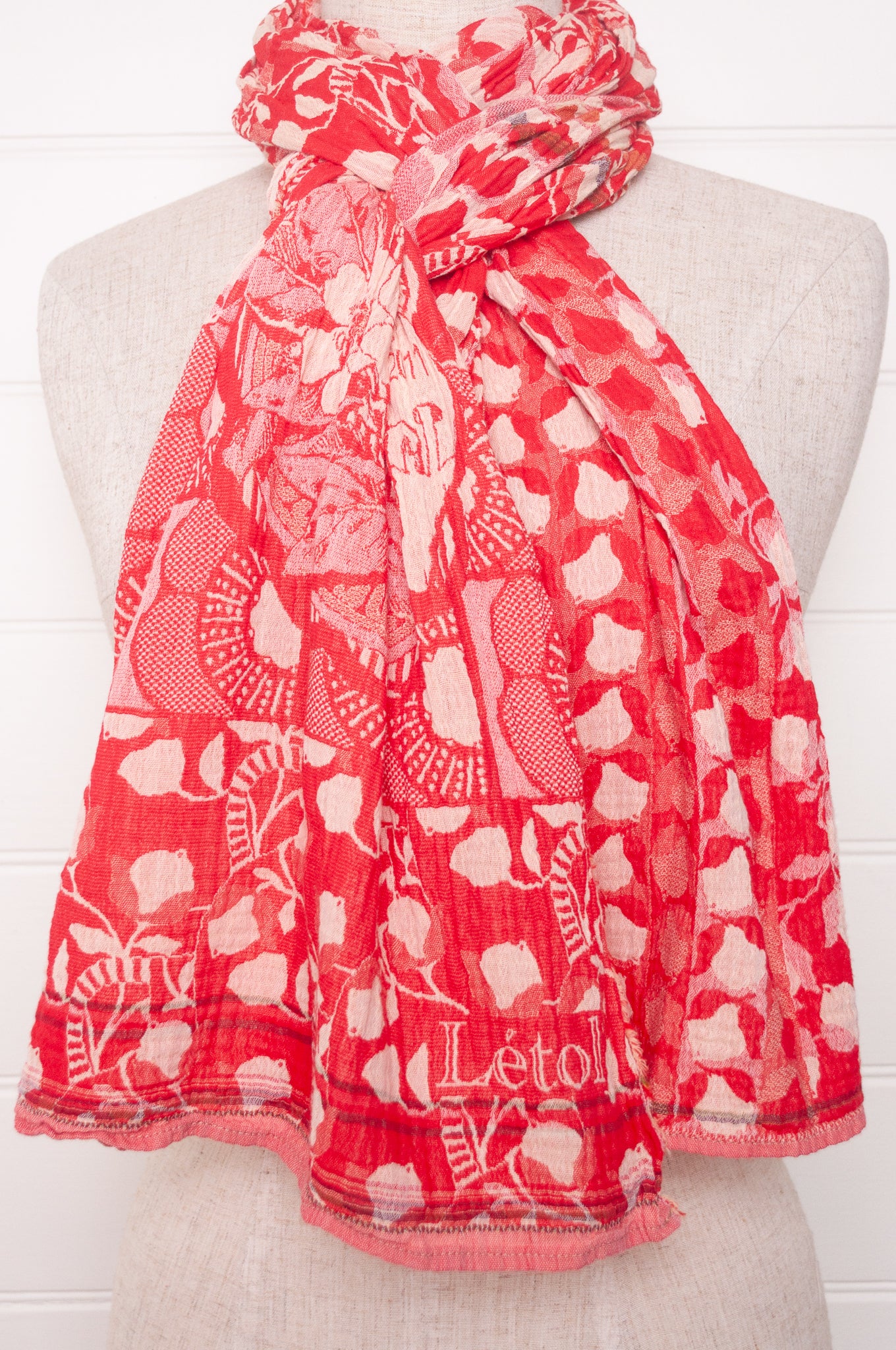 Letol organic cotton jacquard weave scarf Lino flowers and geometrics in cerise cherry red.