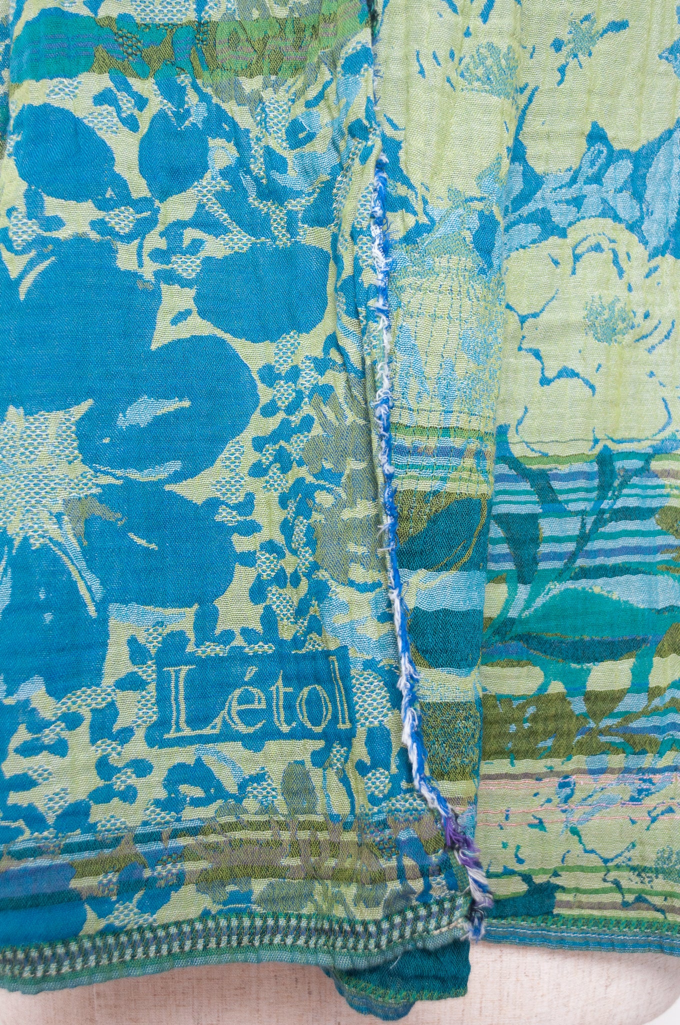 Letol organic cotton floral jacquard scarf Emilienne floral design in lagune, deep turquoise and lime green.