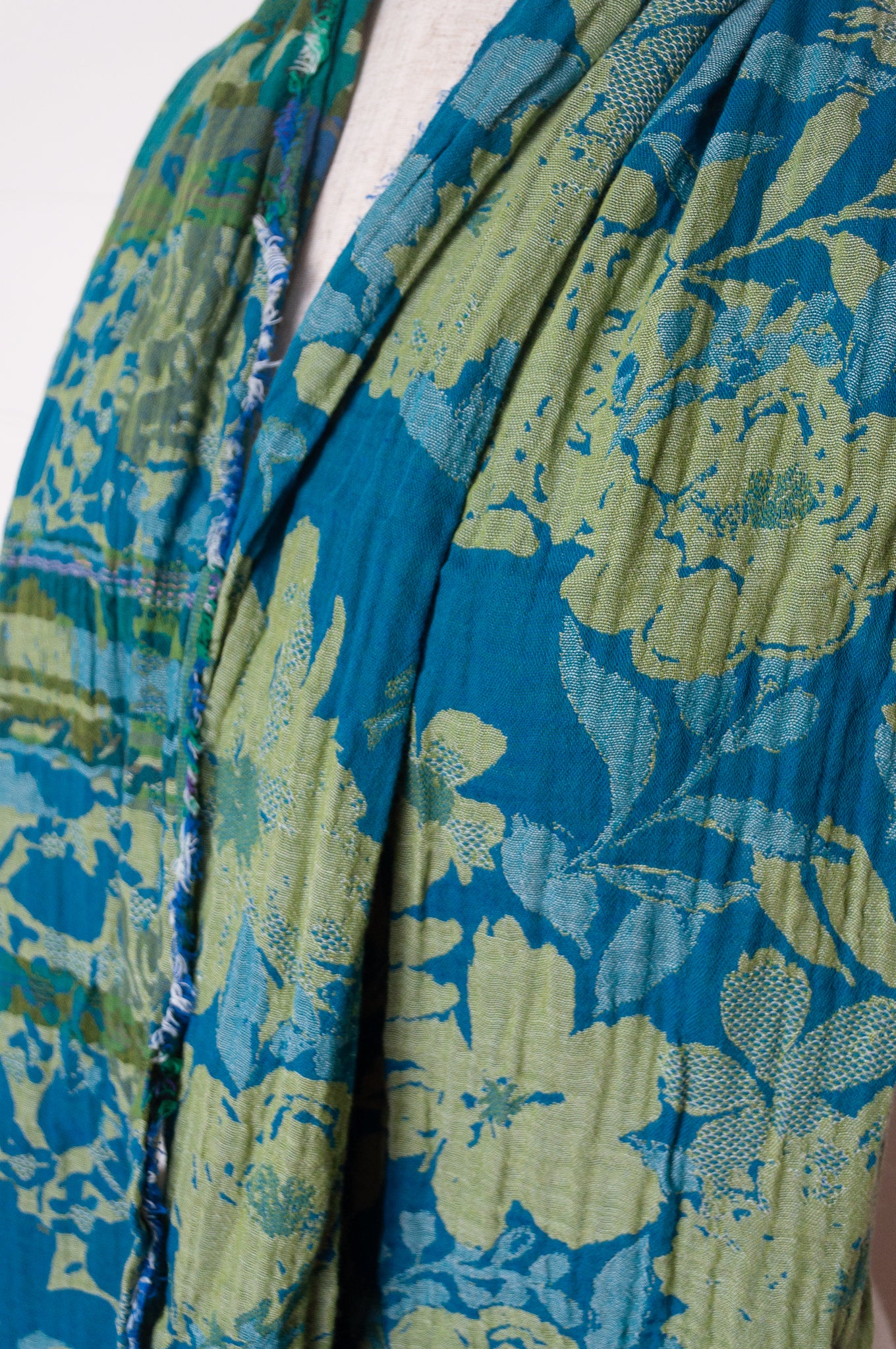 Letol organic cotton floral jacquard scarf Emilienne floral design in lagune, deep turquoise and lime green.