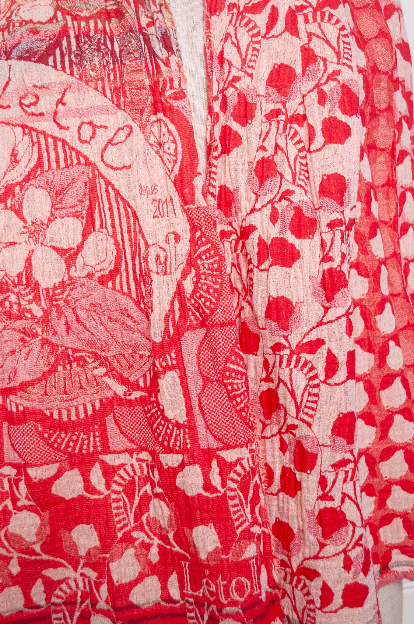 Letol organic cotton jacquard weave scarf Lino flowers and geometrics in cerise cherry red.