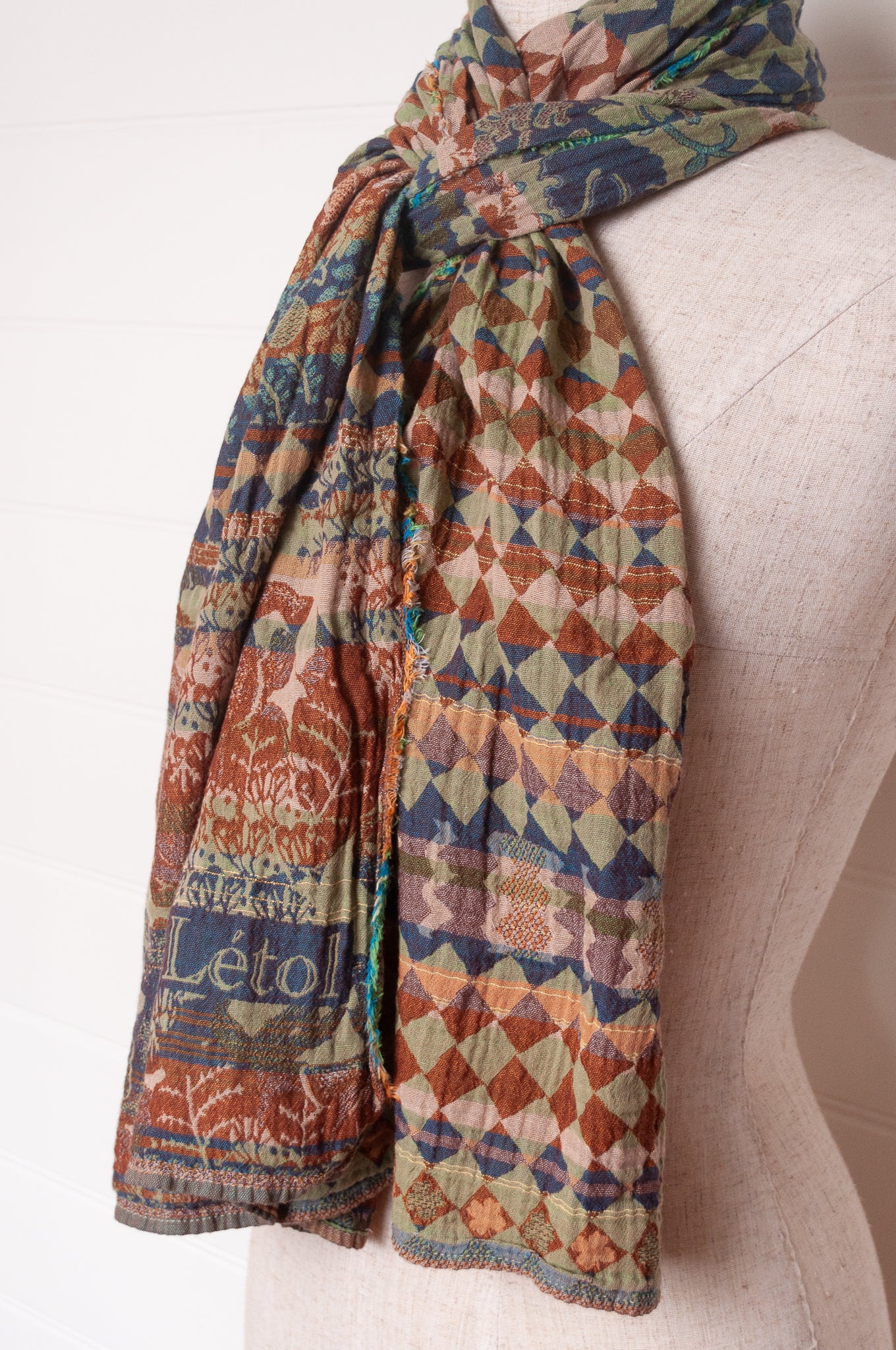 Letol organic cotton jacquard weave scarf Felicien Indian inspired with checks foliage and elephants in pickle green, brown and teal.