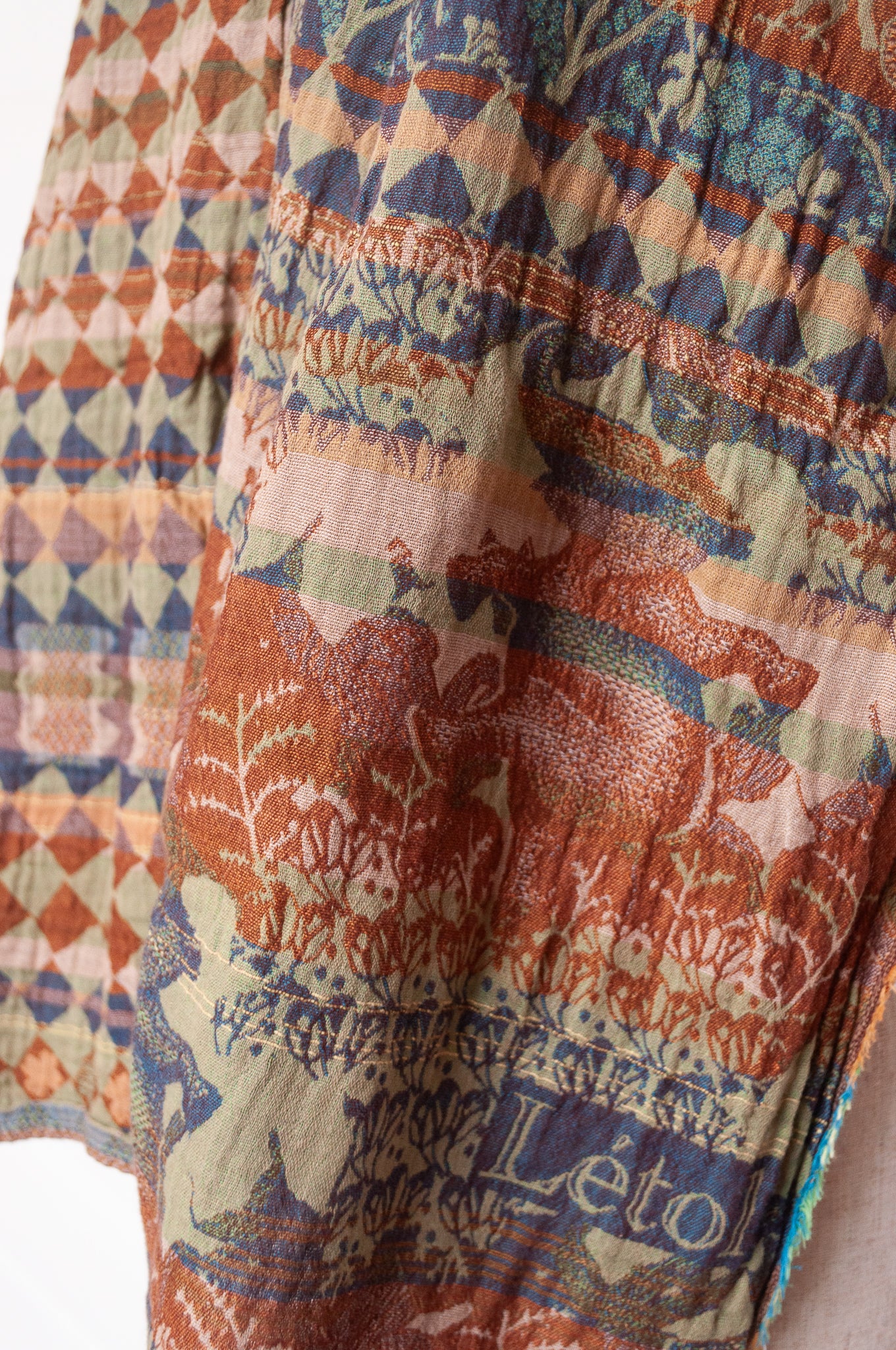 Letol organic cotton jacquard weave scarf Felicien Indian inspired with checks foliage and elephants in pickle green, brown and teal.