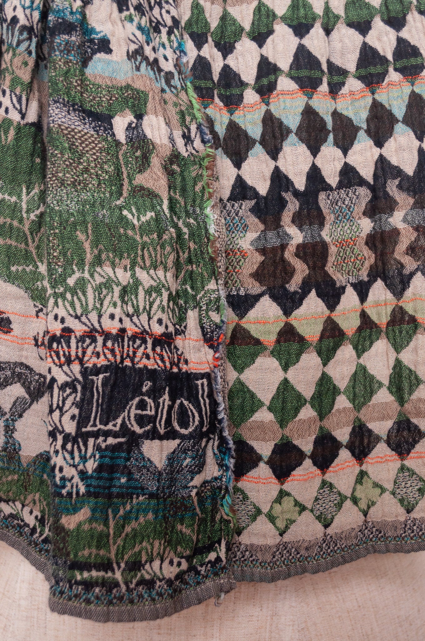 Letol organic cotton jacquard weave scarf in Felicien Indian design with elephants and check in black and green nuit jade.