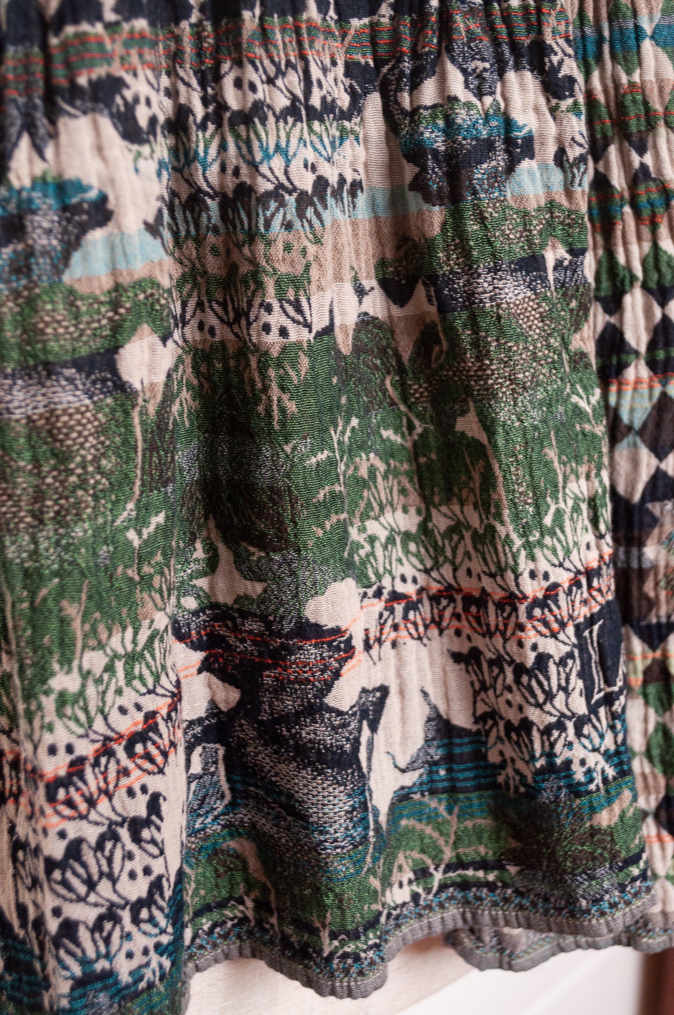 Letol organic cotton jacquard weave scarf in Felicien Indian design with elephants and check in black and green nuit jade.