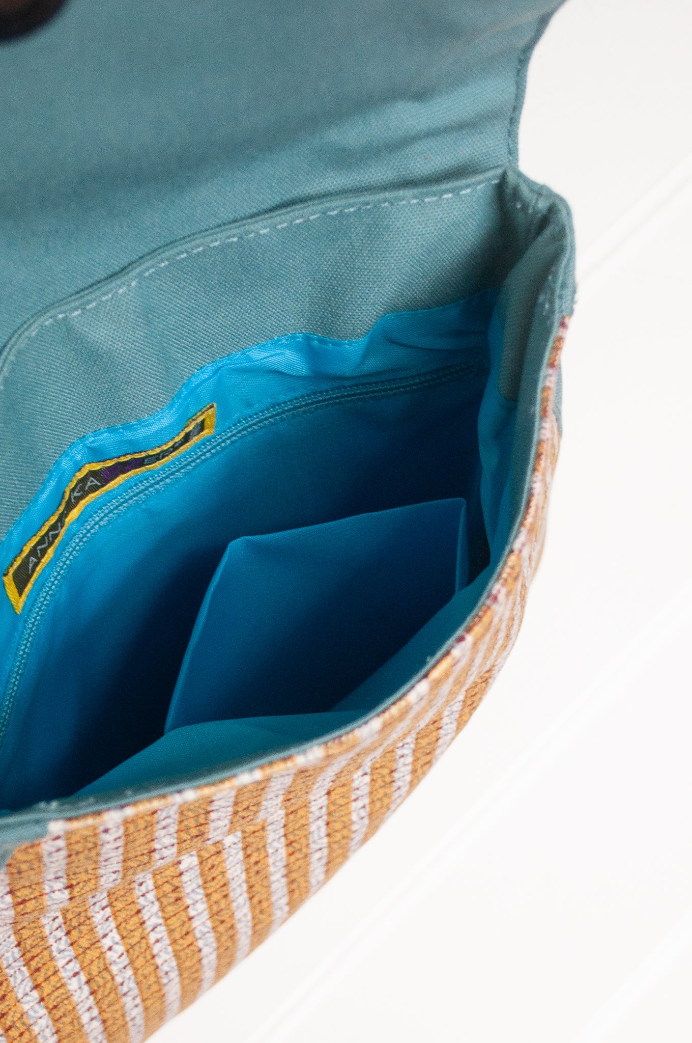 Anna Kaszer cotton canvas Samara  crossbody bag in blue and mustard.