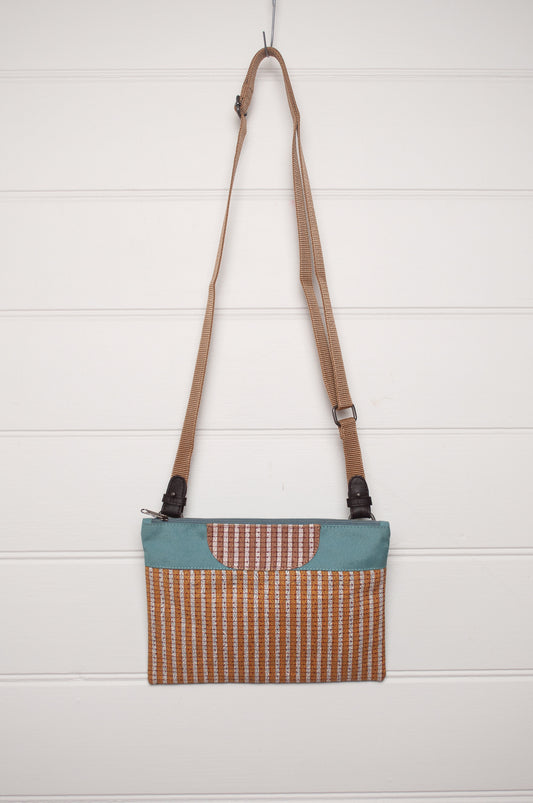 Anna Kaszer cotton canvas Rola mini crossbody bag in mustard and aqua.