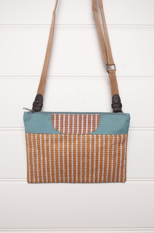 Anna Kaszer cotton canvas Rola mini crossbody bag in mustard and aqua.