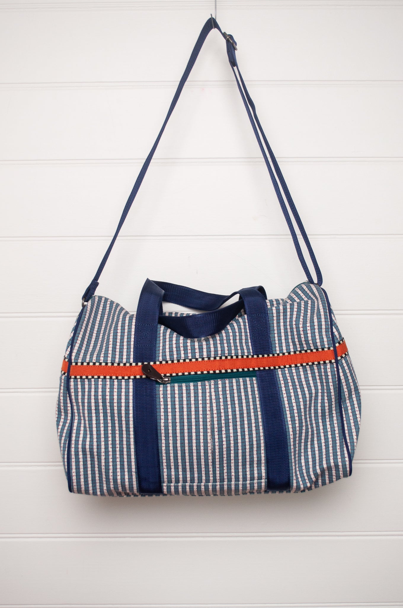 Anna Kaszer Helzip cotton canvas weekend duffle bag in blue stripe.