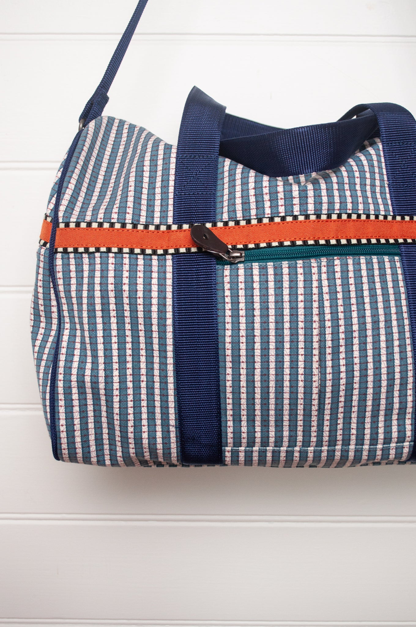 Anna Kaszer Helzip cotton canvas weekend duffle bag in blue stripe.