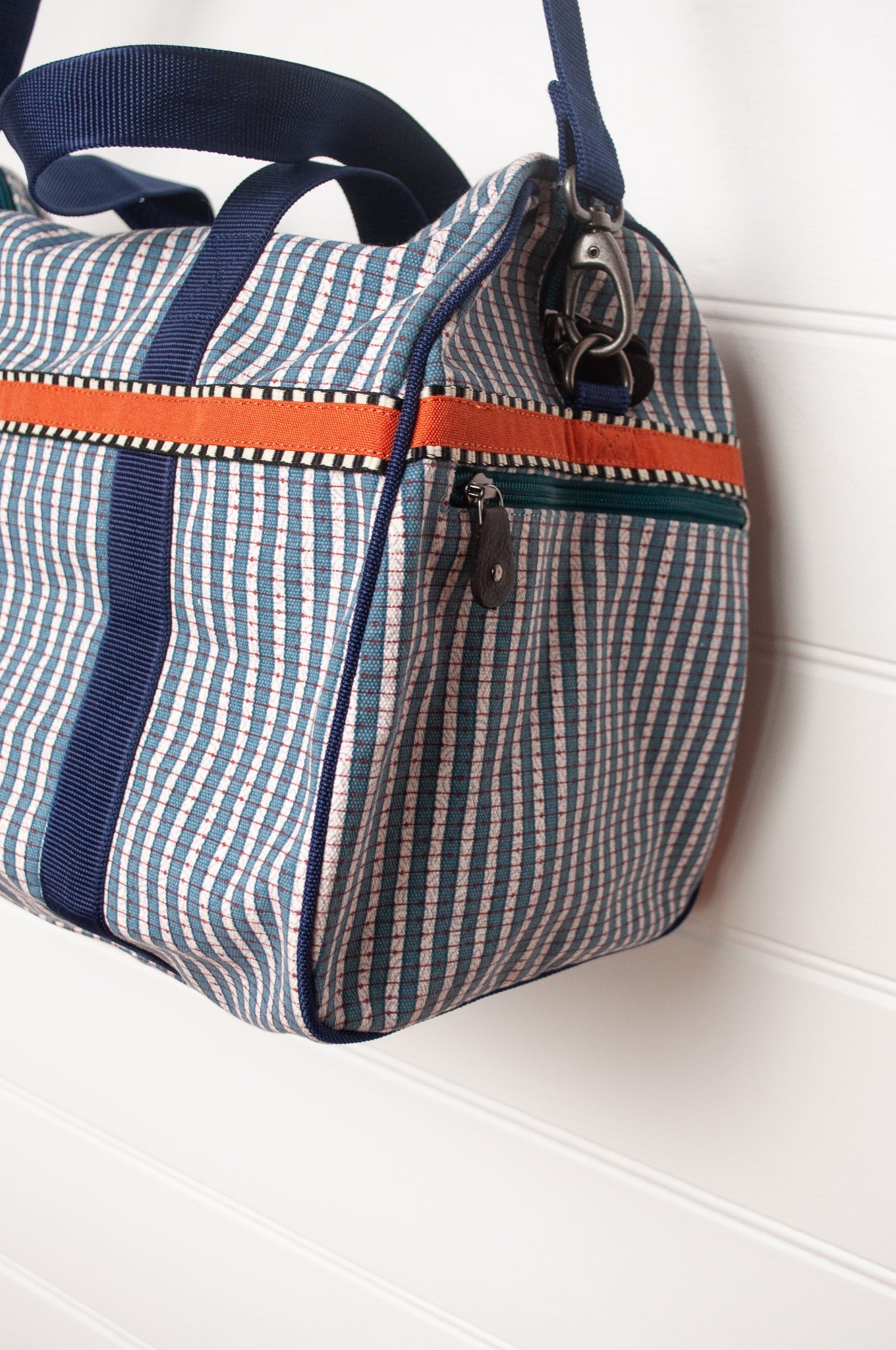 Anna Kaszer Helzip cotton canvas weekend duffle bag in blue stripe.